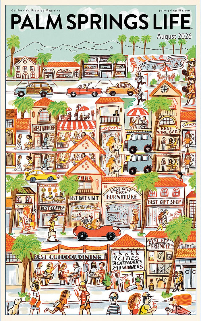 August 2026 cover of PALM SPRINGS LIFE, showing a busy street scene with storefronts, cars, palm trees, people, and small signs in a retro cartoon style.